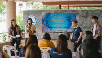 Speaker presents Coral College initiative at Chalong Pier, Phuket press conference, 24 July 2025.
