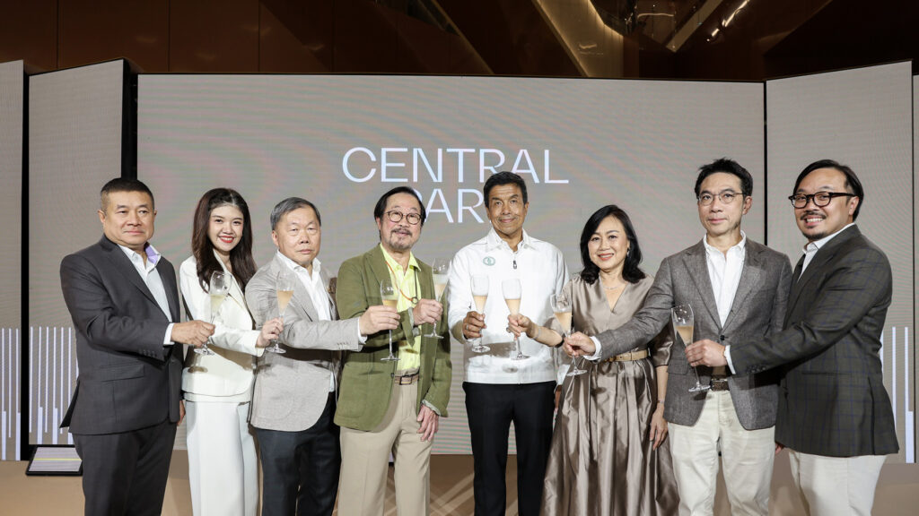 Executives and Bangkok Governor toast at Central Park Shopping Centre grand opening.