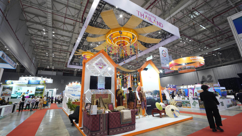 Thailand Pavilion booth at ITE HCMC 2025 featuring Thai fabrics, crafts, and cultural displays.