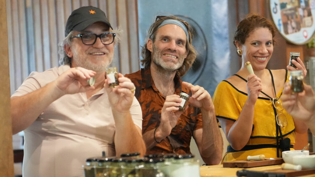 International delegates experience herbal workshop in Krabi, highlighting sustainable tourism and local wisdom.