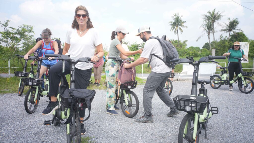 Delegates explore Krabi by eco-friendly bicycles, promoting low-carbon travel during Global Meaningful Travel Summit.
