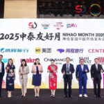 Group photo on stage Nihao Month Guangzhou 2025 with Thai and Chinese delegates and partner logos.