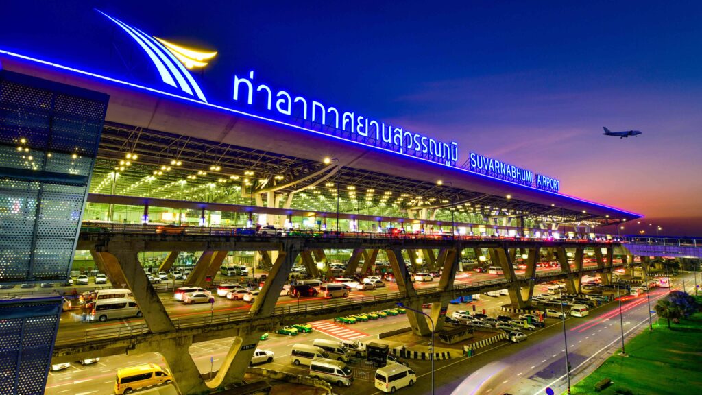 Suvarnabhumi Airport night view with lights and airplane