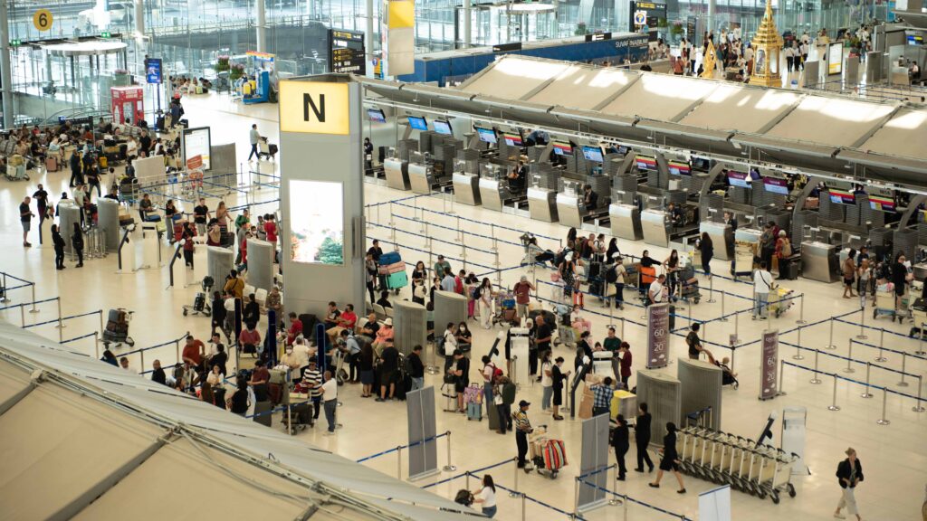 Suvarnabhumi Airport check-in counters with passengers