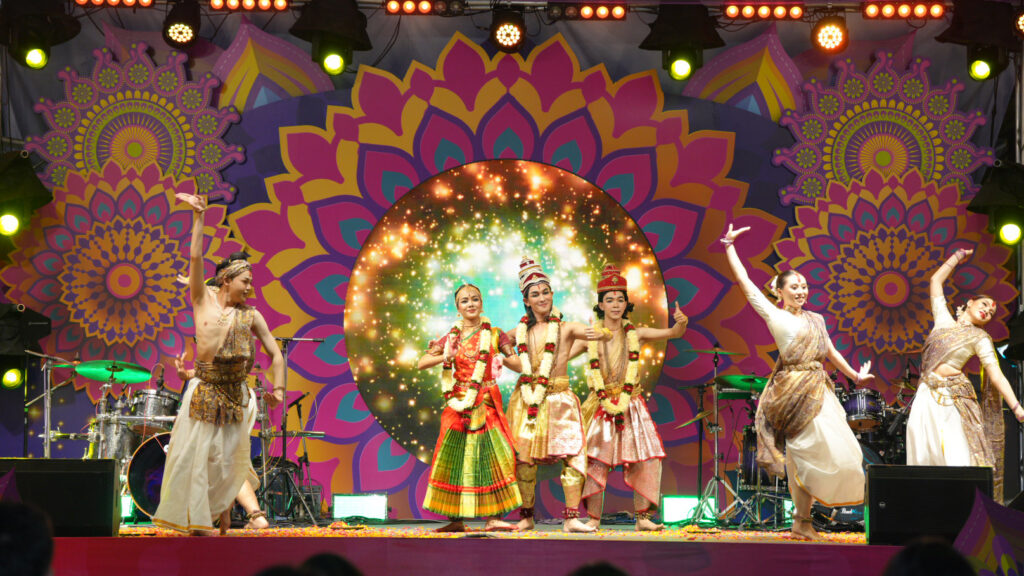 Thai and Indian performers dance together in the Festival of Light finale celebrating Diwali’s message of harmony and joy.