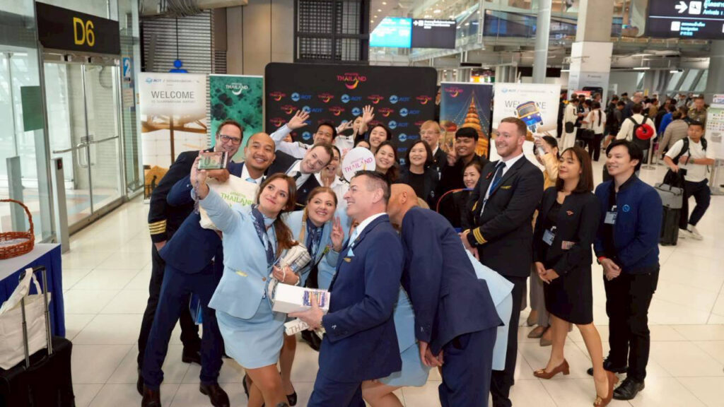 Norse Atlantic Airways cabin crew and Thai officials take a cheerful group selfie at Suvarnabhumi Airport after the maiden flight from London.