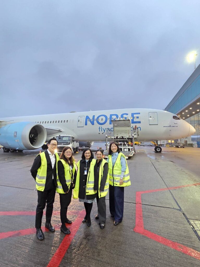 TAT Stockholm Office team at Stockholm Arlanda Airport with Norse Atlantic Airways aircraft for the inaugural Stockholm–Bangkok flight.