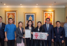 Certificate presentation ceremony marking TAT’s ISO 22301:2019 Business Continuity Management System renewal from BSI, attended by executives and officials.