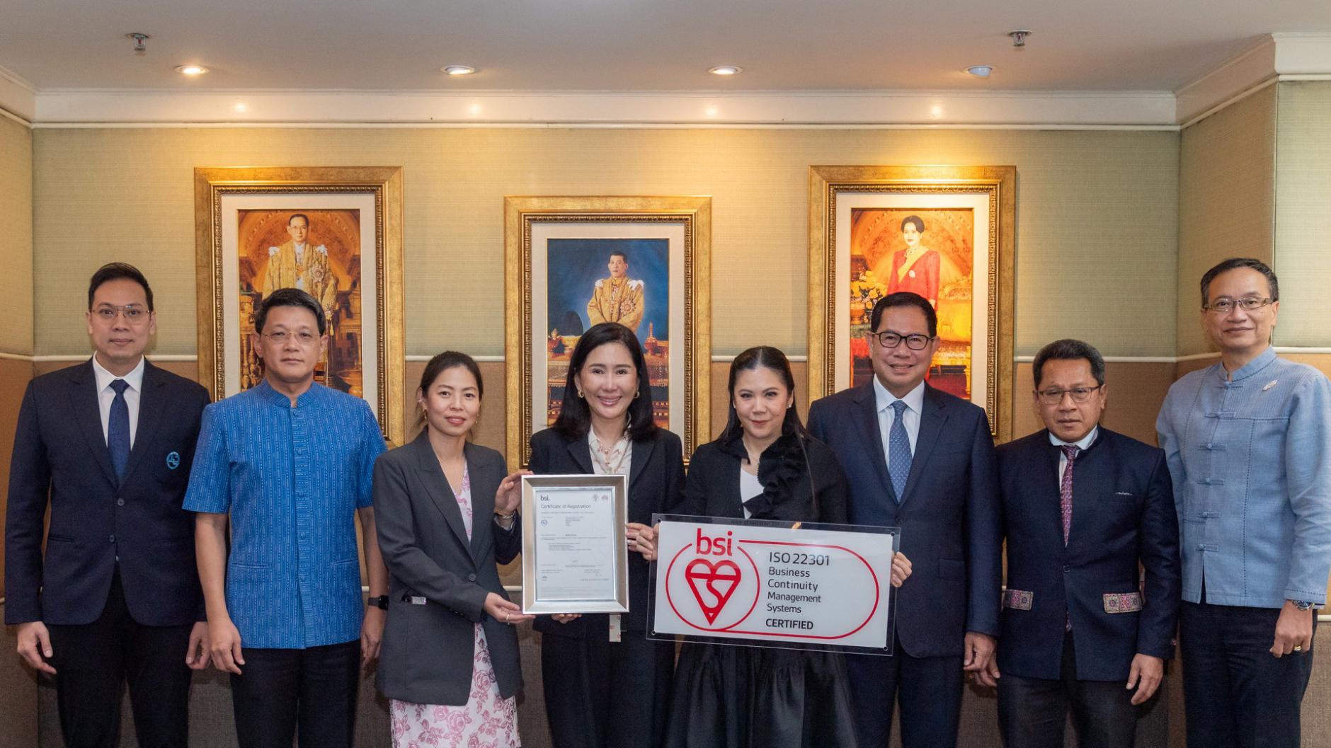 Certificate presentation ceremony marking TAT’s ISO 22301:2019 Business Continuity Management System renewal from BSI, attended by executives and officials.