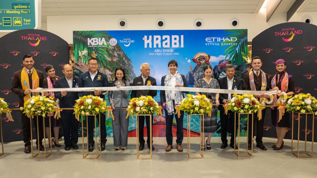Ribbon-cutting ceremony celebrating Etihad Airways’ inaugural Abu Dhabi–Krabi flight, joined by Thai and Etihad representatives at Krabi International Airport.
