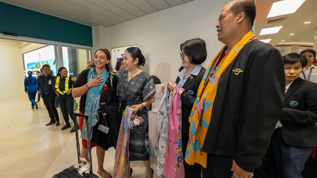 TAT Governor and partners welcome arriving passengers from Etihad Airways’ first Abu Dhabi–Krabi flight with traditional Thai scarves.