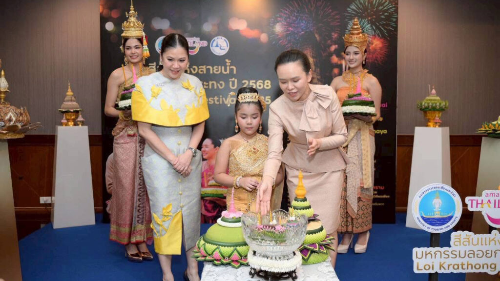 Representatives and guests participate in a Krathong offering activity at the Loi Krathong Festival 2025 preview, celebrating Thai cultural heritage.