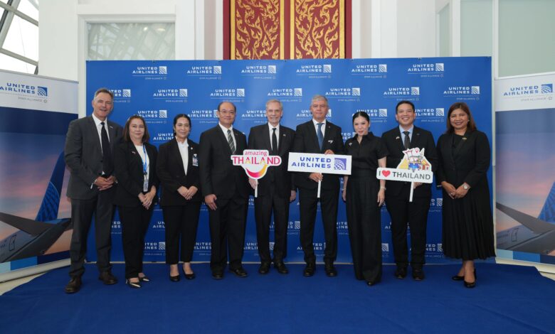 Officials from the Tourism Authority of Thailand and United Airlines pose together during the inaugural Los Angeles–Bangkok flight welcome event at Suvarnabhumi Airport.