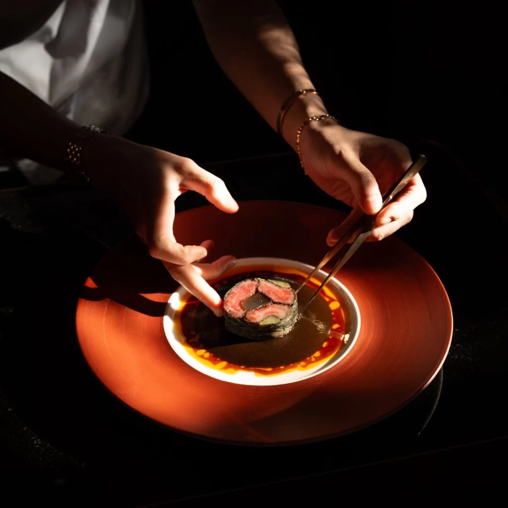 Beautifully presented Thai-inspired seafood dish at Baan Tepa, Bangkok, showcasing creativity and sustainability in Michelin-starred cuisine.