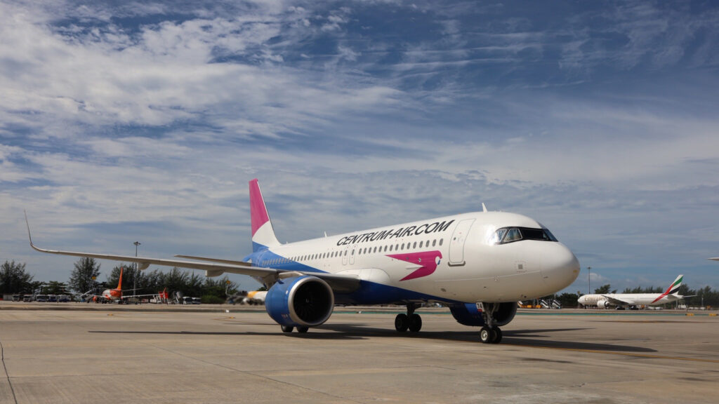 Centrum Air aircraft on the tarmac at Phuket International Airport during the inaugural Tashkent–Phuket flight.