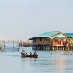 Fishing village and stilt houses at Ko Yo in Songkhla Lake, symbolising the connection between local livelihoods, ingredients, and the city’s culinary creativity.