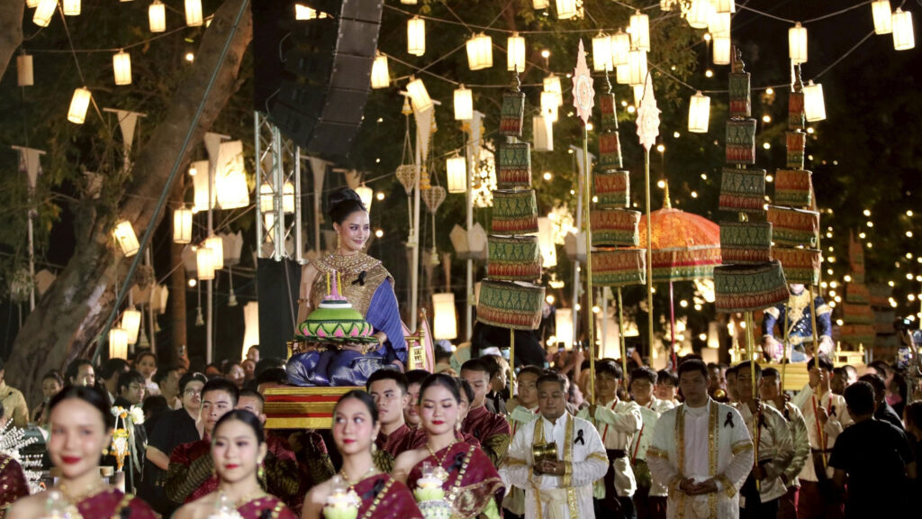 A grand Noppamas procession with traditional lanterns and Thai dancers parades through Ayutthaya Historical Park during Maha Loi Krathong 2025.