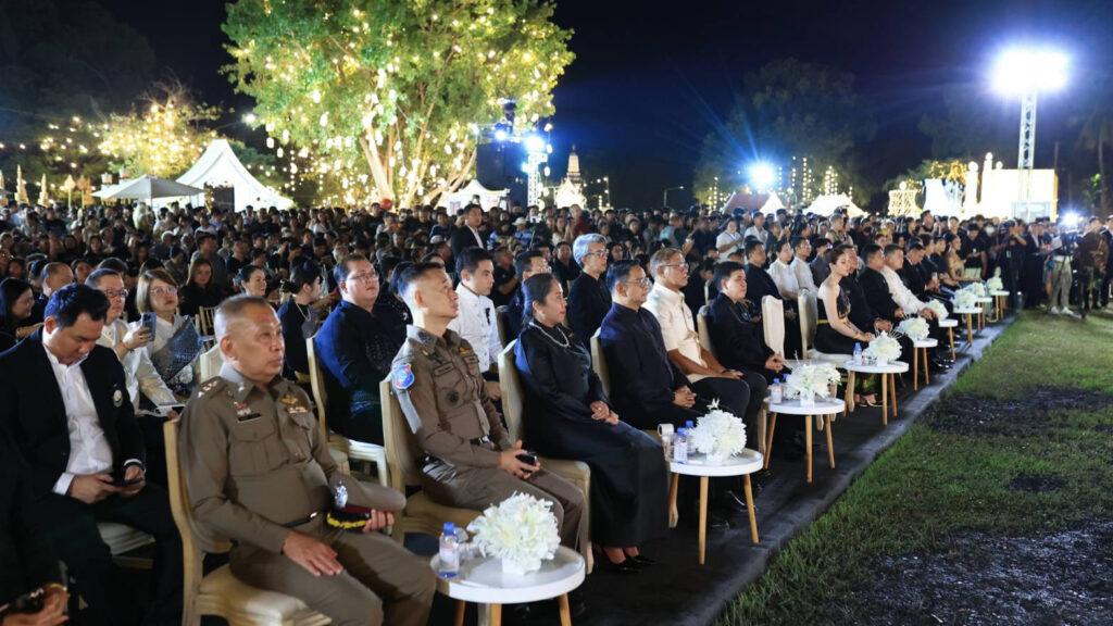 Guests and visitors attend the opening ceremony of Maha Loi Krathong @Ayutthaya 2025 under a canopy of lights at Wat Phra Ram.