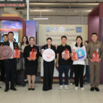 Group photo of TAT executives, immigration officers, and airport partners promoting the Amazing Thailand Passport Privileges 2025 campaign at Suvarnabhumi Airport.