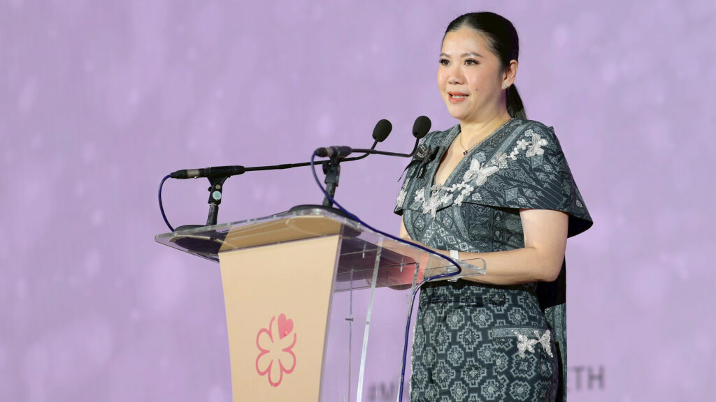 A speaker delivers remarks at the podium during the MICHELIN Guide Ceremony Thailand 2026, set against a soft purple backdrop.