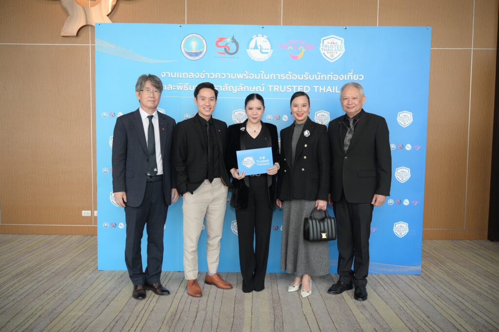 Representatives pose with a Trusted Thailand certificate at the event backdrop, highlighting stakeholder participation in Thailand’s new tourism safety standard.