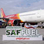 VietJet Thailand aircraft at Suvarnabhumi Airport showcasing the Green Route SAF Fuel banner during the launch of the Bangkok–Phu Quoc sustainable flight.