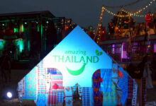 Amazing Thailand pavilion illuminated at Wonderfruit 2025, showcasing TAT’s presence within the festival’s night-time cultural and music setting in Chon Buri.