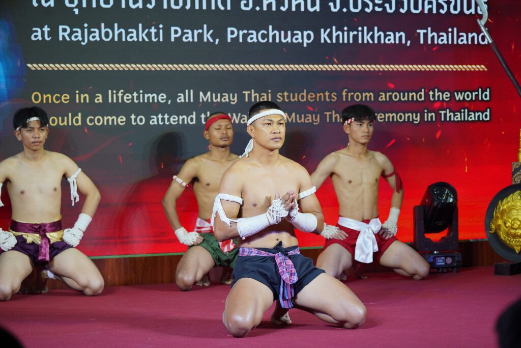 Muay Thai practitioners perform the Wai Kru ritual on stage, highlighting ceremonial traditions central to Muay Thai heritage at the festival launch.