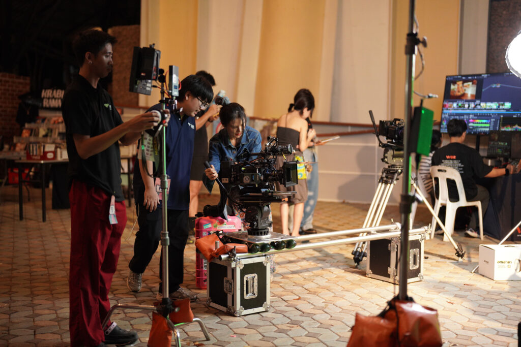 Young filmmakers operate professional camera equipment during hands-on training at Love on Screen Film Festival SS2.