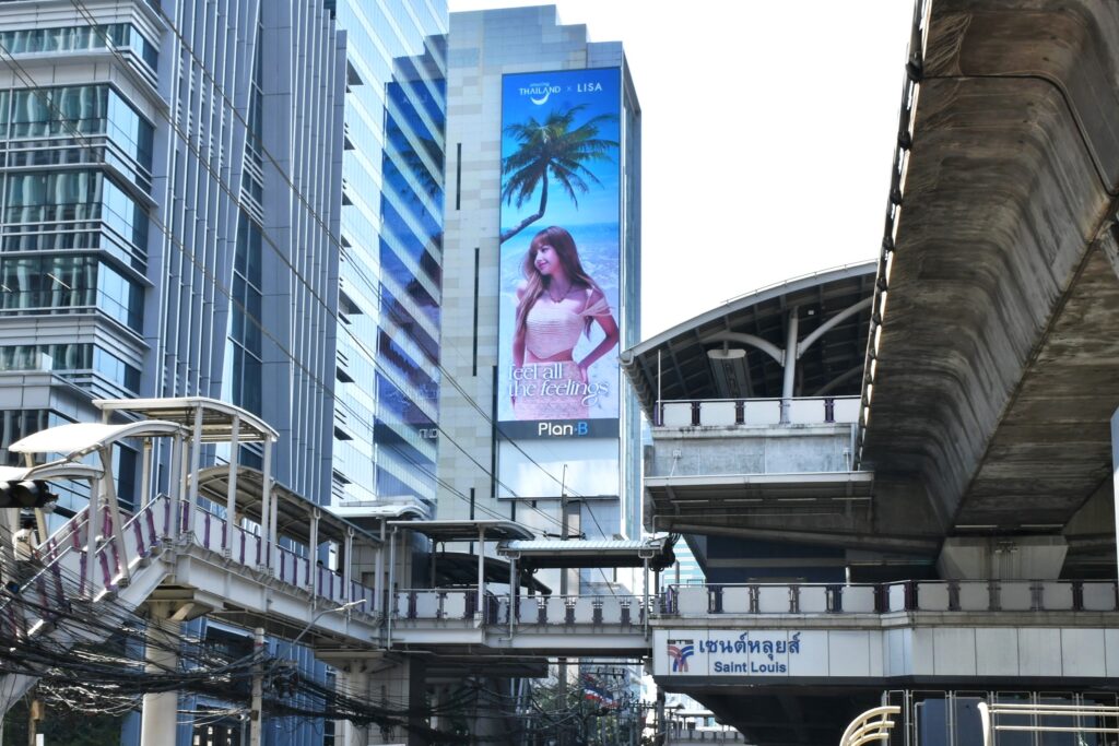 Amazing Thailand x LISA “feel all the feelings” vertical digital billboard near Saint Louis BTS Station, Sathorn, Bangkok.