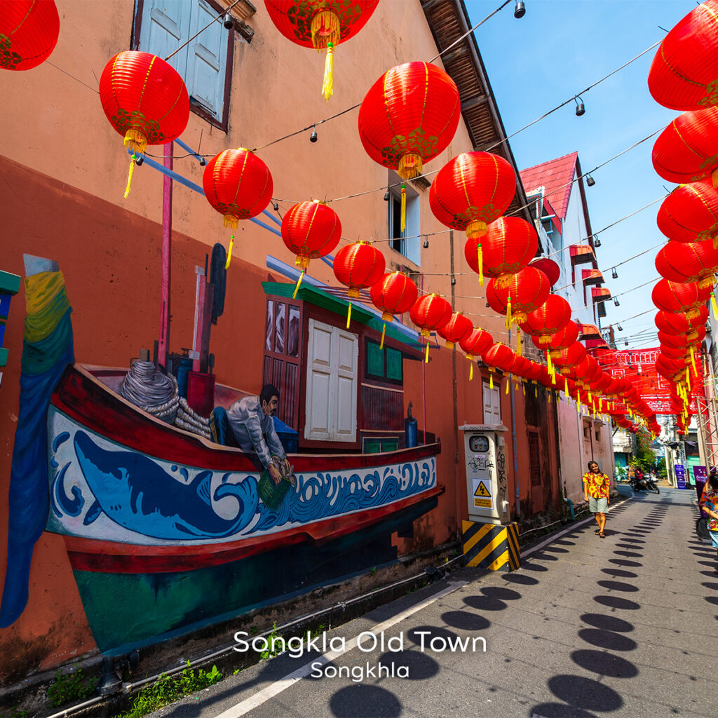 Red lantern-lined street in Songkhla Old Town highlighting Thai-Chinese cultural influence