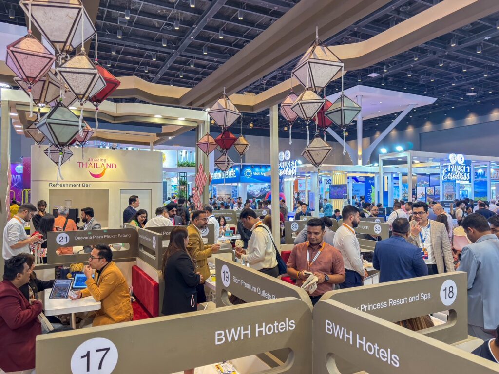 Wide view of the Thailand pavilion business area at Outbound Travel Mart 2026, with Thai tourism operators and Indian buyers engaged in scheduled business appointments under the Amazing Thailand booth structure.