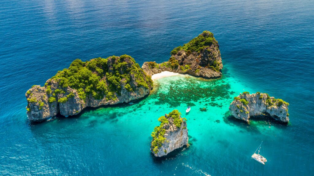Aerial view of Ko Haa in Krabi showcasing crystal-clear waters and world-class dive sites in Thailand