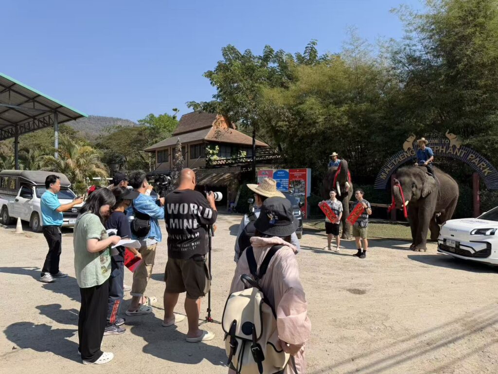 ‘Travel Across Mountains and Seas’ filming at elephant park in northern Thailand highlighting immersive tourism.