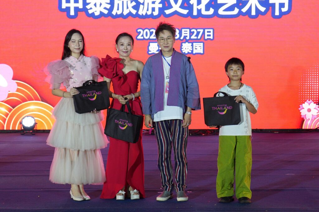 Festival participants posing with awards and gifts