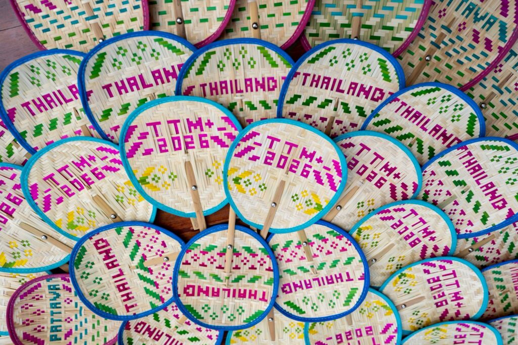 Handwoven TTM+ 2026 souvenir fans highlight Thai craft and local identity.