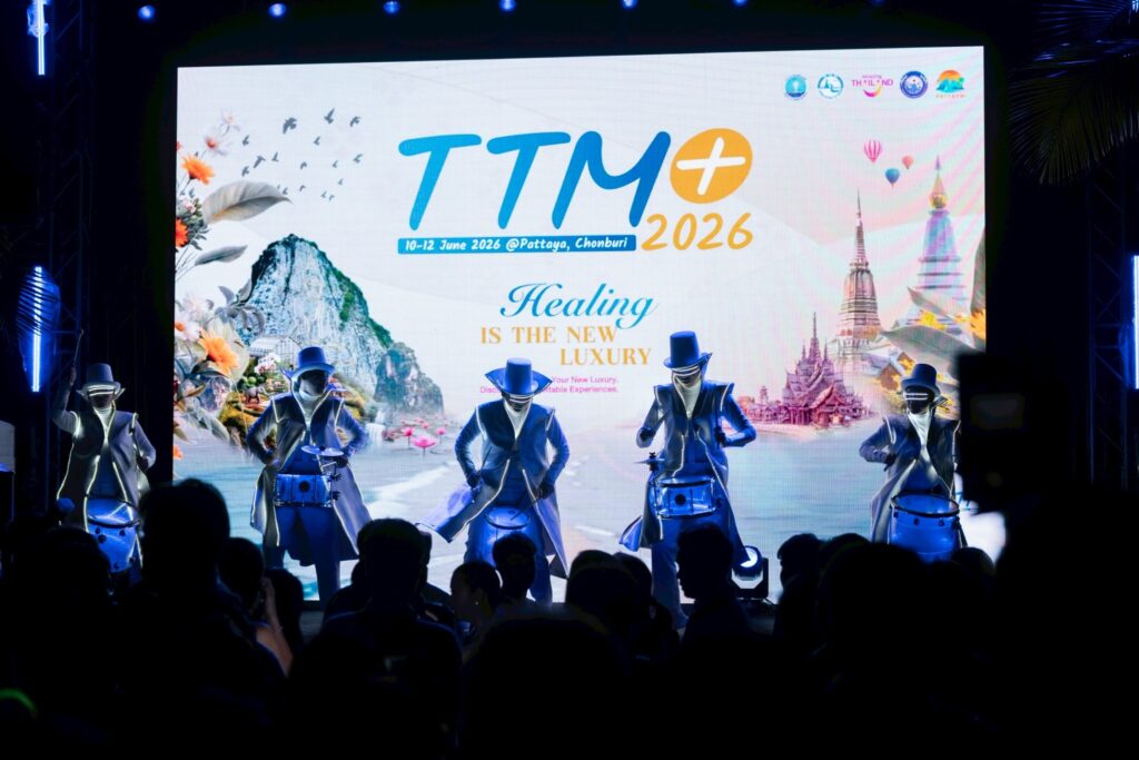 Performers entertain guests in front of the TTM+ 2026 “Healing is the New Luxury” stage.