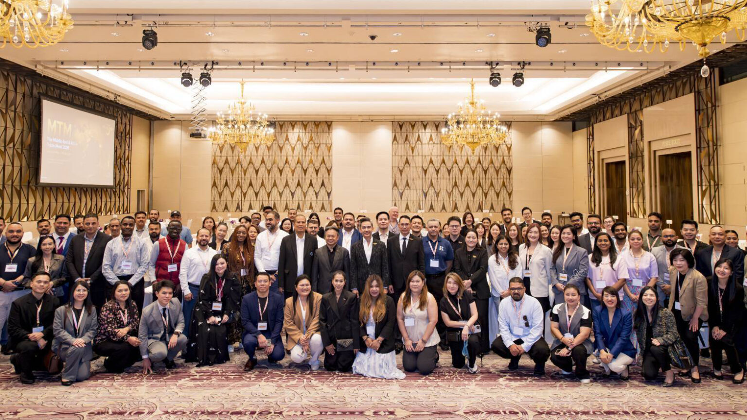 1. TAT hosts MTM 2026 group photo with Middle East and Africa buyers and Thai tourism suppliers in Bangkok.