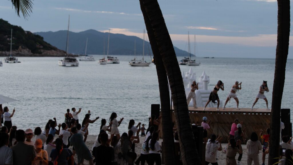 Beachside performance energises Global Wellness Day 2026 celebrations in Ko Samui, Thailand.