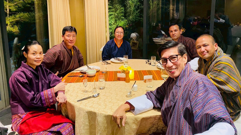Thai delegates and Bhutanese hosts share a traditional dinner during the fam trip.