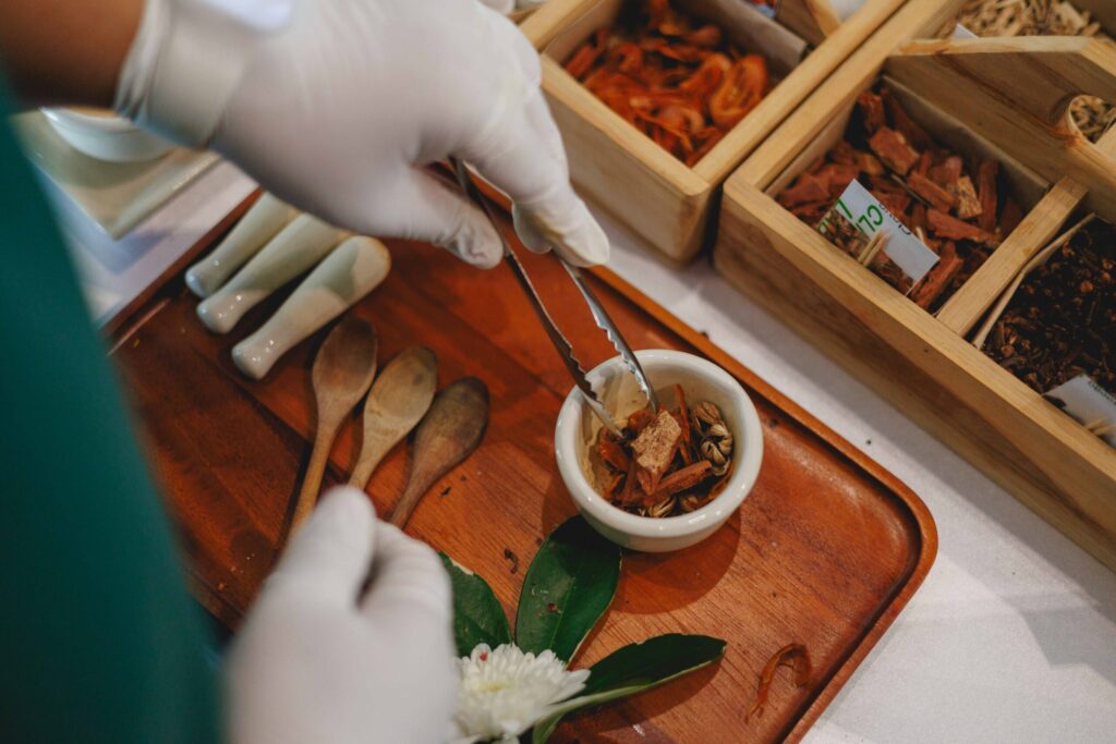 Thai herbal ingredients are prepared for a science-based wellness activity in Phang-nga.
