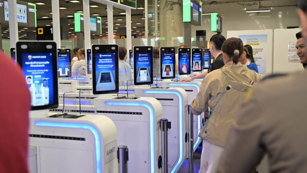 Travellers use biometric automated passport-control gates at Suvarnabhumi Airport’s immigration area.