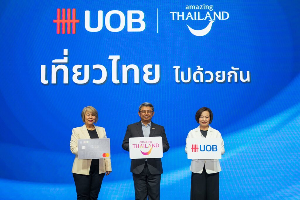 TAT and UOB representatives launch the Travel Thailand Together campaign beneath the Amazing Thailand and UOB logos.