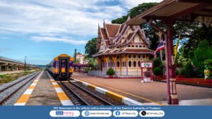 Train beside the historic royal pavilion at Hua Hin Railway Station
