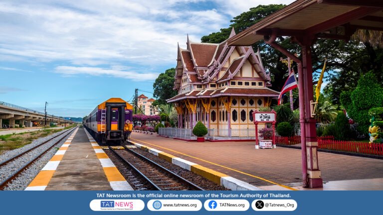Train beside the historic royal pavilion at Hua Hin Railway Station