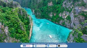 Aerial view of turquoise waters and limestone cliffs in southern Thailand, showcasing the Kingdom’s cinematic landscape for global film productions.