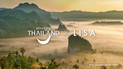 Mist-covered limestone peaks at sunrise in Phu Lang Ka National Park, Phayao, with forested hills emerging above the clouds and the “Amazing Thailand x LISA” campaign branding overlaid on the landscape.