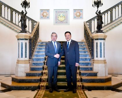 H.E. Mr. Wang Yi, Minister of Foreign Affairs of the People's Republic of China, and H.E. Mr. Anutin Charnvirakul, Prime Minister of Thailand, shake hands at Government House, Bangkok, during the official bilateral meeting, April 2026.